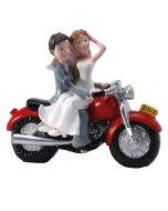 Couple mariés sur moto rouge