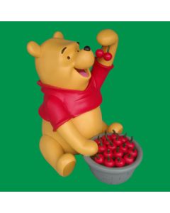 Winnie l'Ourson mangeant des cerises